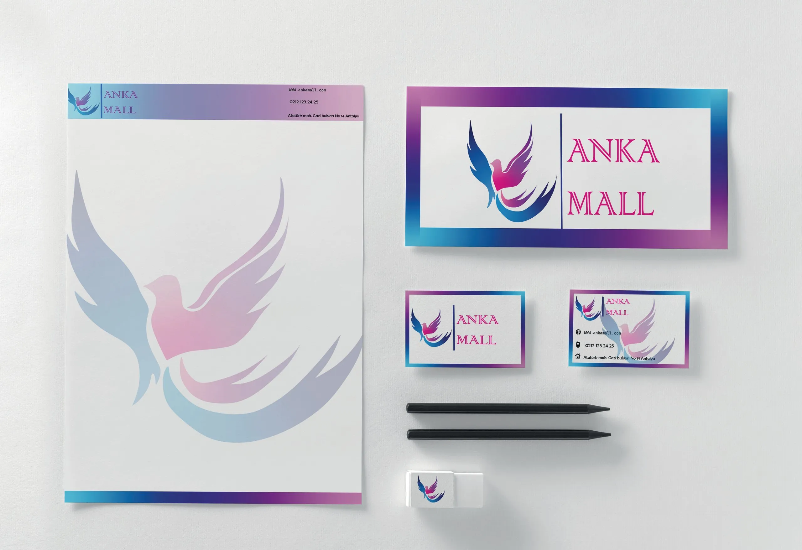 Anka Mall kurumsal kimlik: antetli kâğıt, zarf ve iki kartvizit üzerinde kuş logosu.